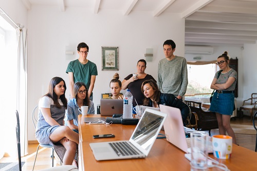 group of people watching on laptop some barriers to speaking effectively