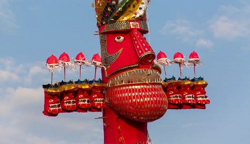 a red effigy about When is Dussehra